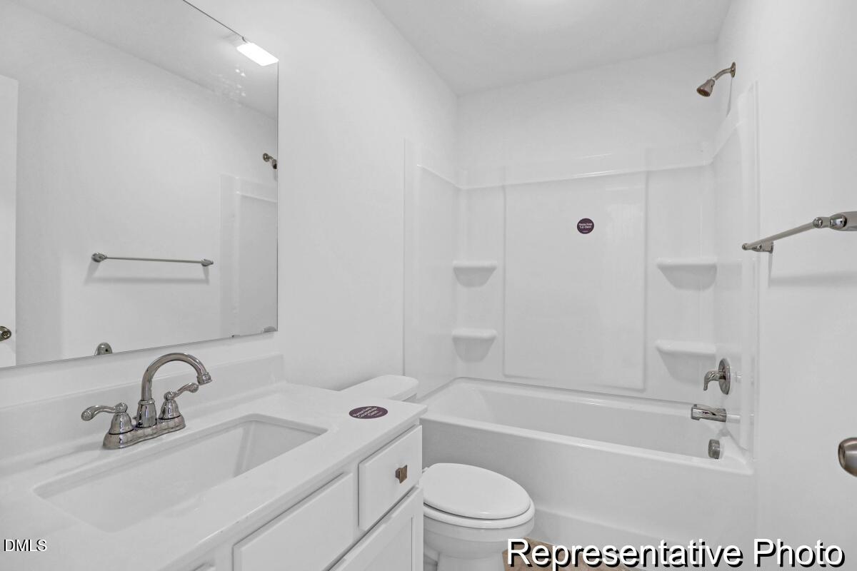 40 Birchstone Trail, Unit 225P Erwin, NC 28339 - Photo 17 of 26 a bathroom with a sink toilet and bathtub