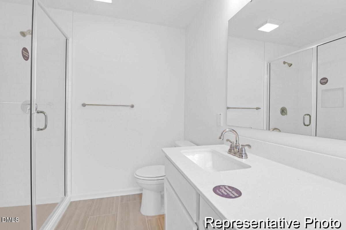 40 Birchstone Trail, Unit 225P Erwin, NC 28339 - Photo 22 of 26 a bathroom with a sink toilet and shower