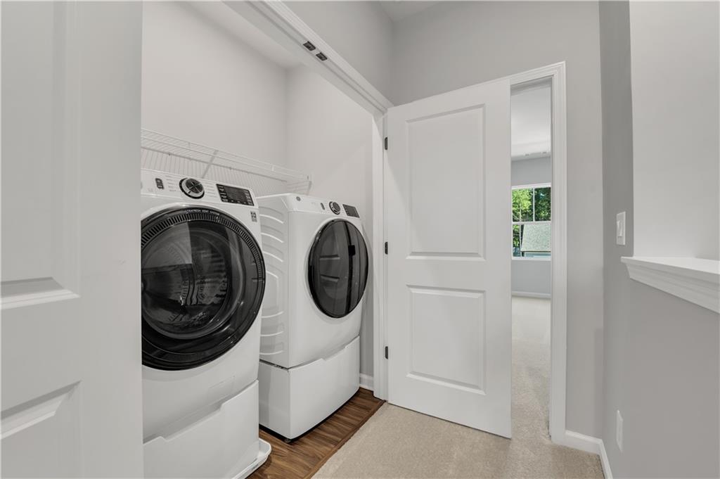 644 Devon Alley Acworth, GA 30102 - Photo 26 of 32 a utility room with dryer and washer