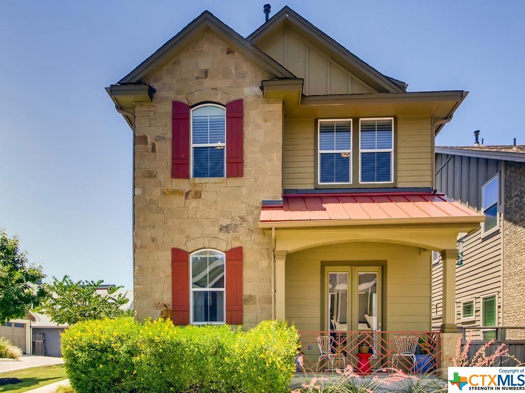 7901 Wildcat Pass Austin, TX 78757 - Photo 1 of 1 a front view of a house with outdoor seating