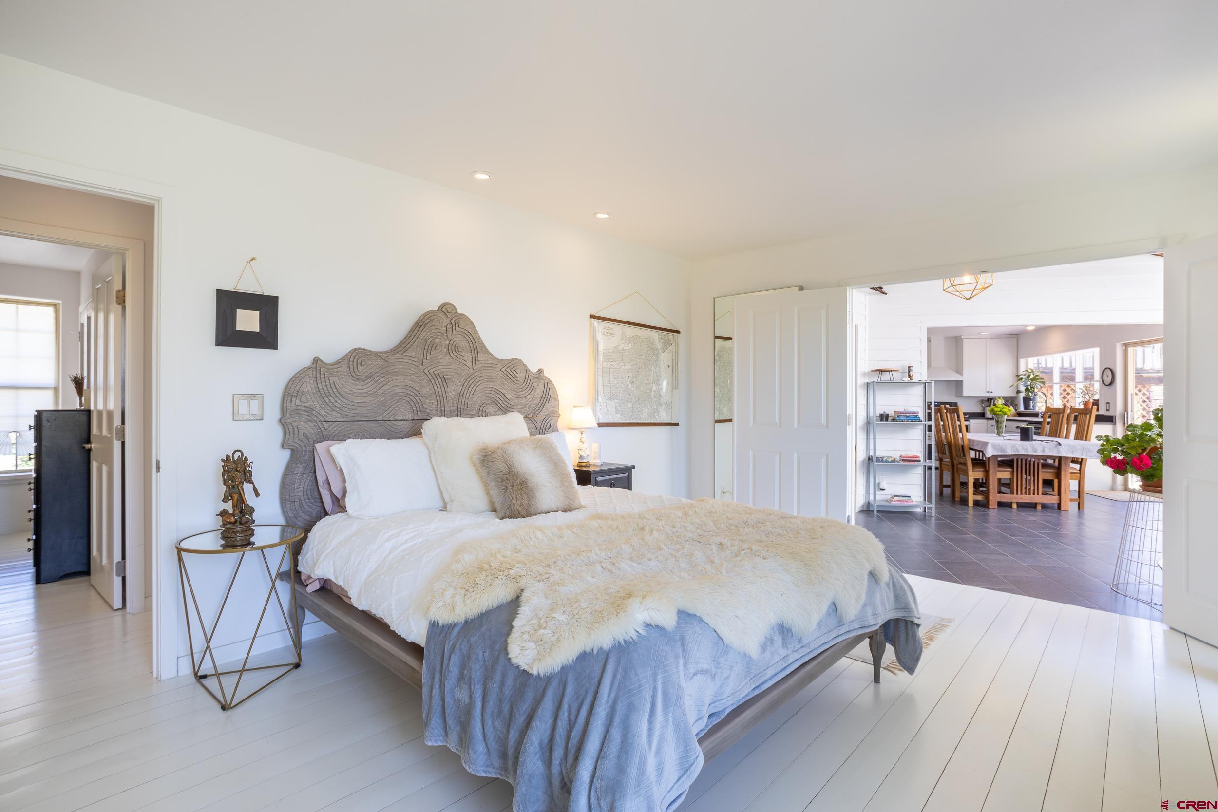 42224 Foothills Road Paonia, CO 81428 - Photo 17 of 40 a bedroom with a bed and table chair
