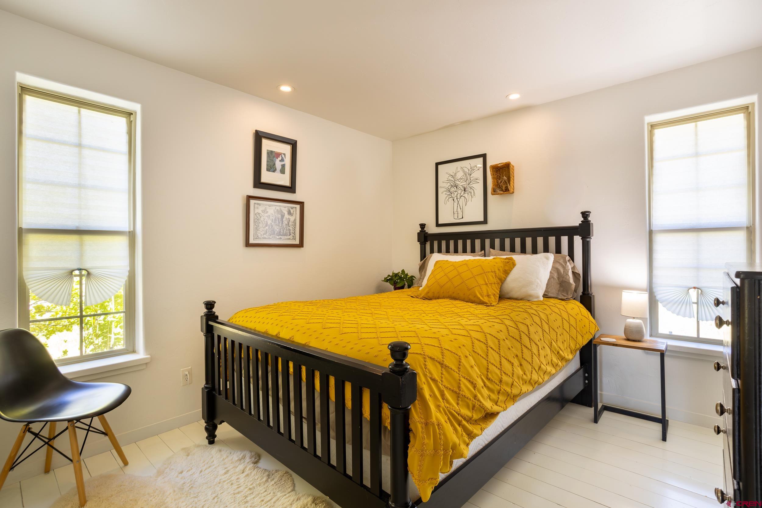 42224 Foothills Road Paonia, CO 81428 - Photo 19 of 40 a bedroom with a bed and window