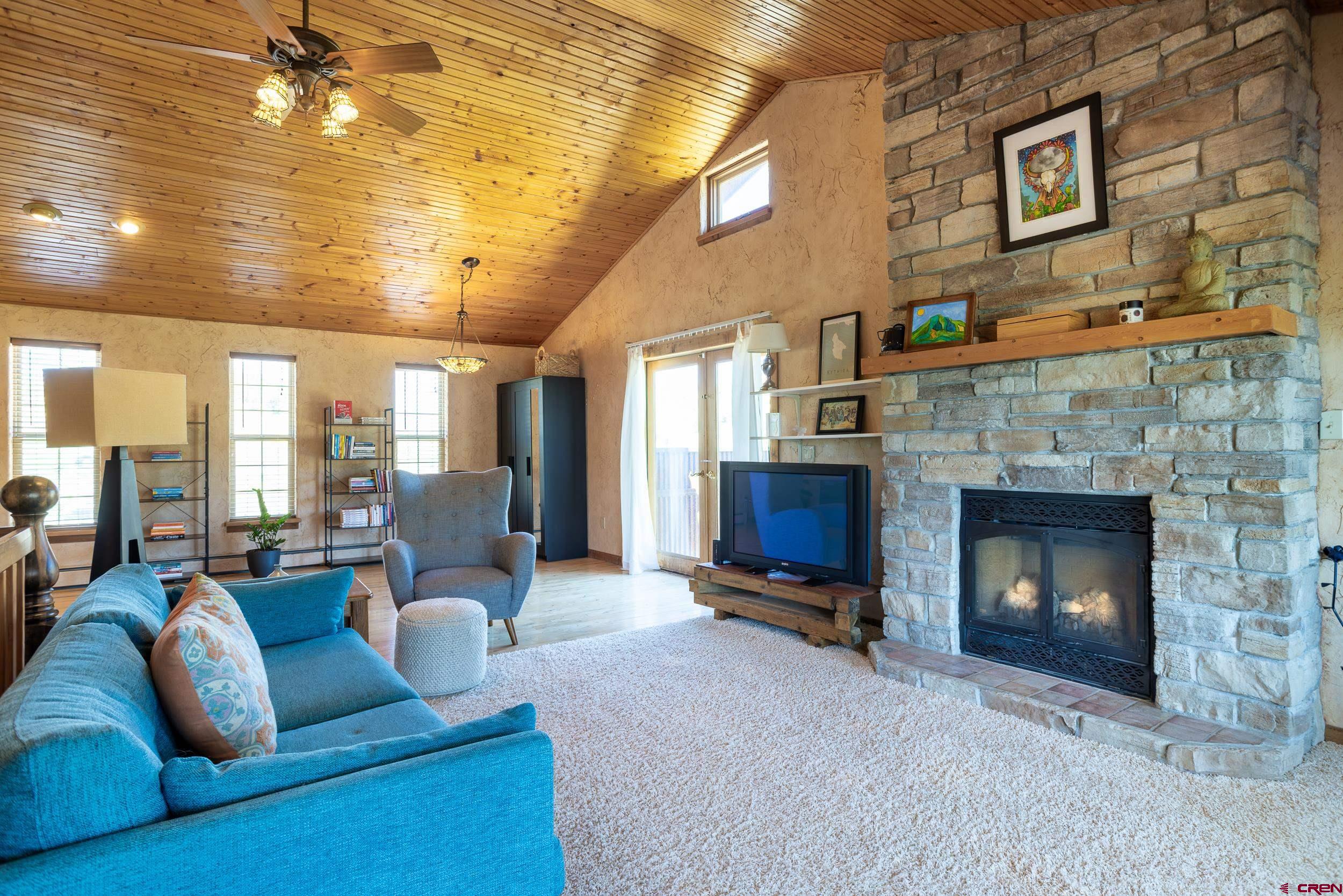 42224 Foothills Road Paonia, CO 81428 - Photo 25 of 40 a living room with furniture and a fireplace