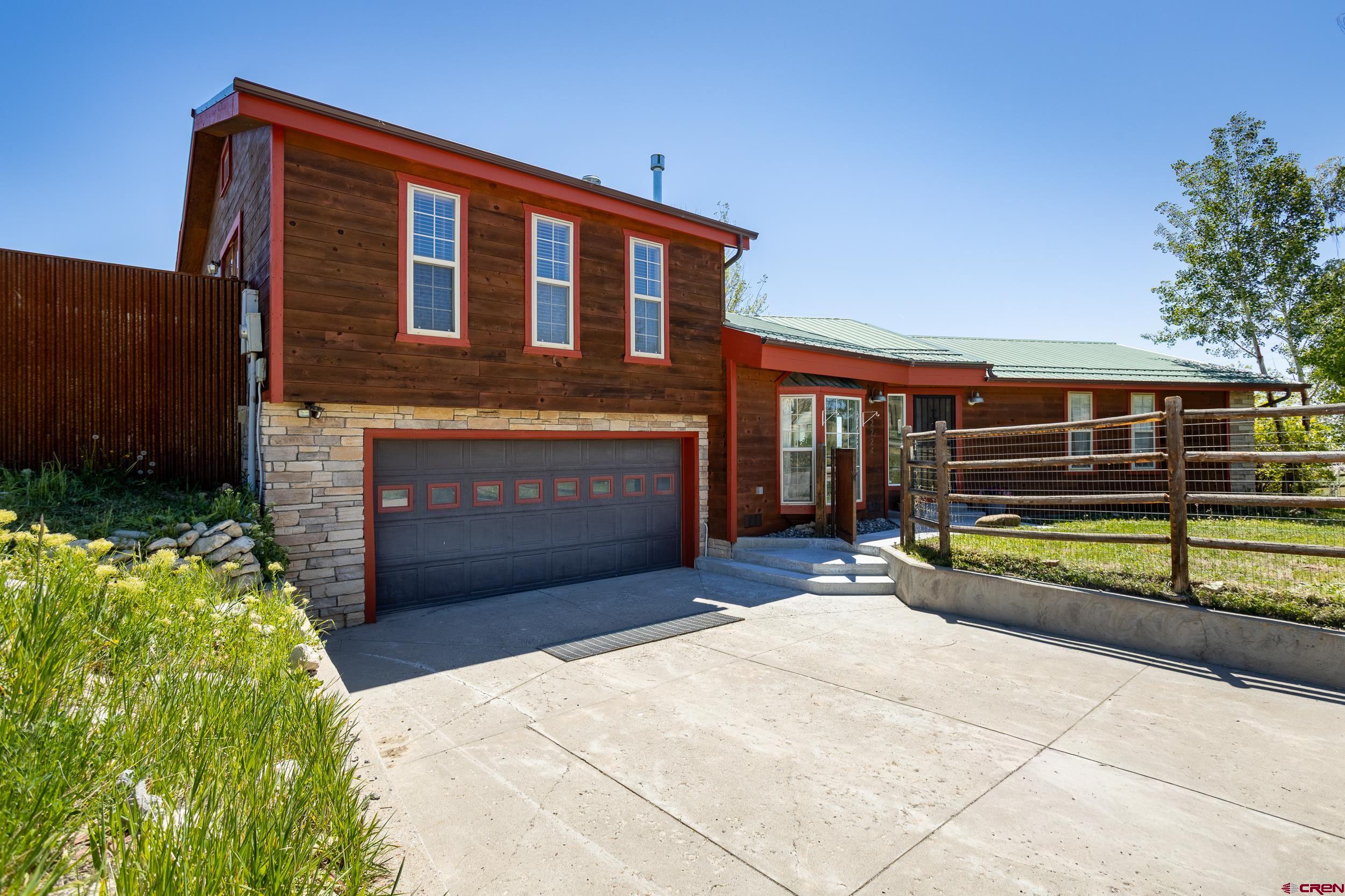 42224 Foothills Road Paonia, CO 81428 - Photo 30 of 40 a backyard of a house with yard and outdoor seating