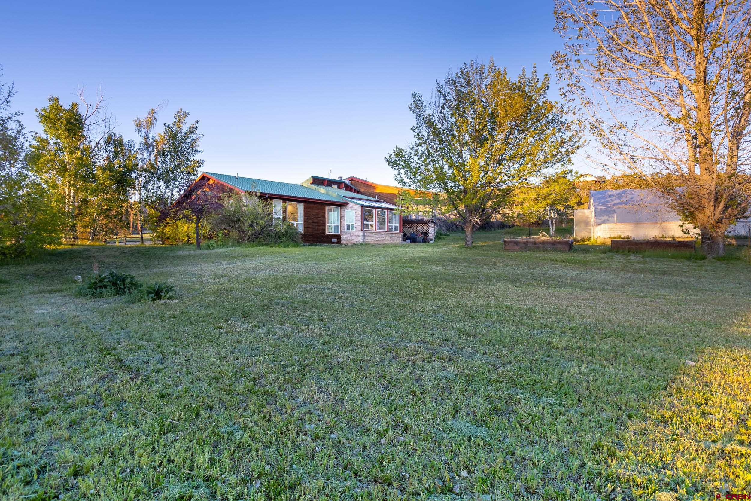 42224 Foothills Road Paonia, CO 81428 - Photo 3 of 40 a view of a house with a yard