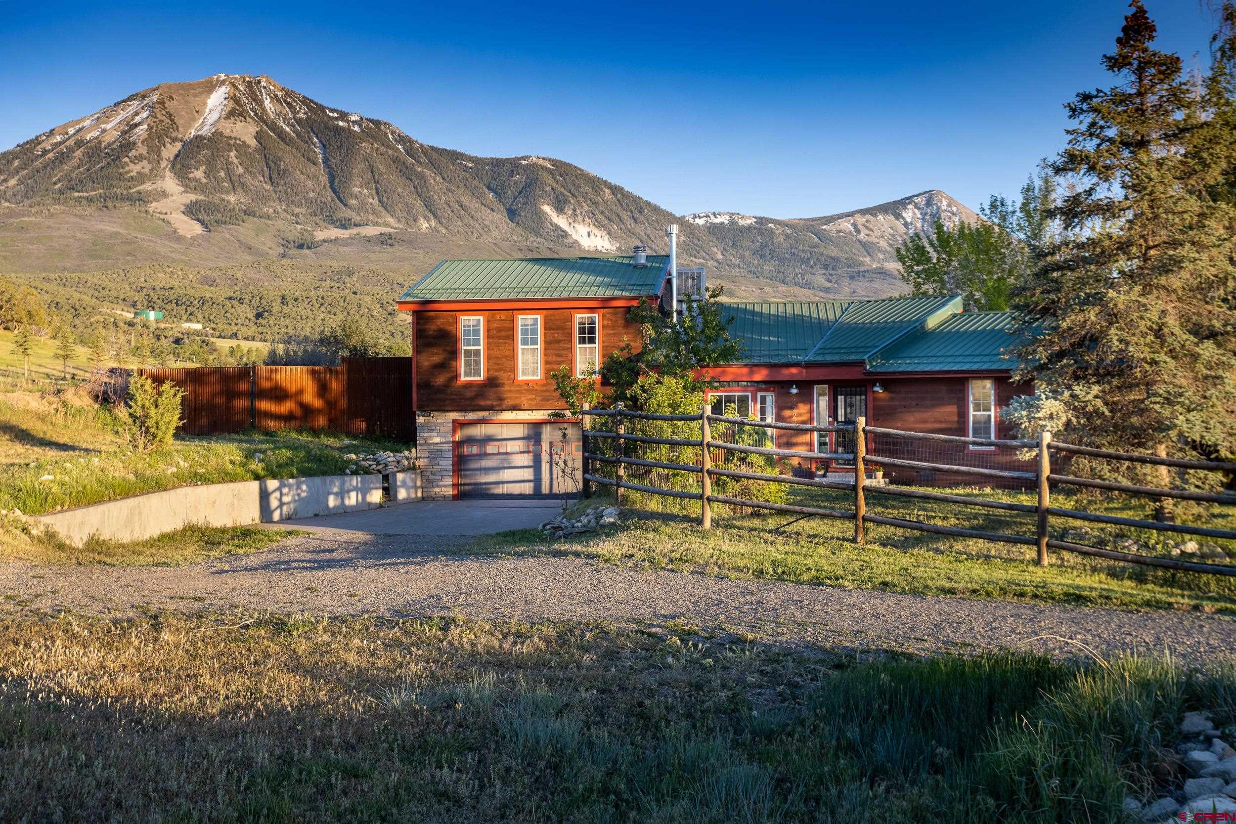 42224 Foothills Road Paonia, CO 81428 - Photo 36 of 40 a front view of a house with a yard