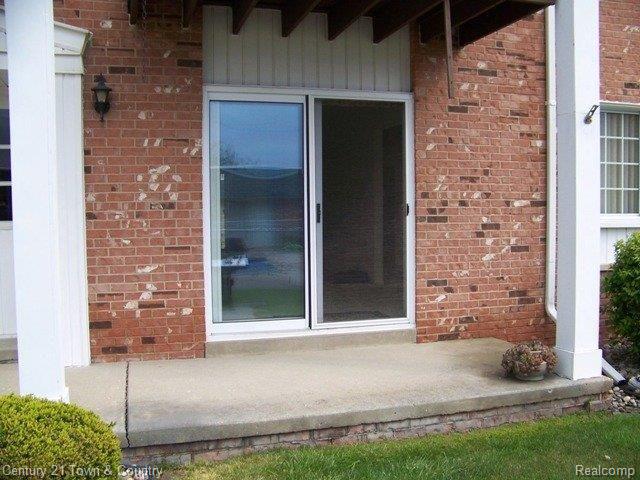 1508 Normandy Road, Unit 109 Royal Oak, MI 48073 - Photo 1 of 16 Porch overlooking pool.JPG