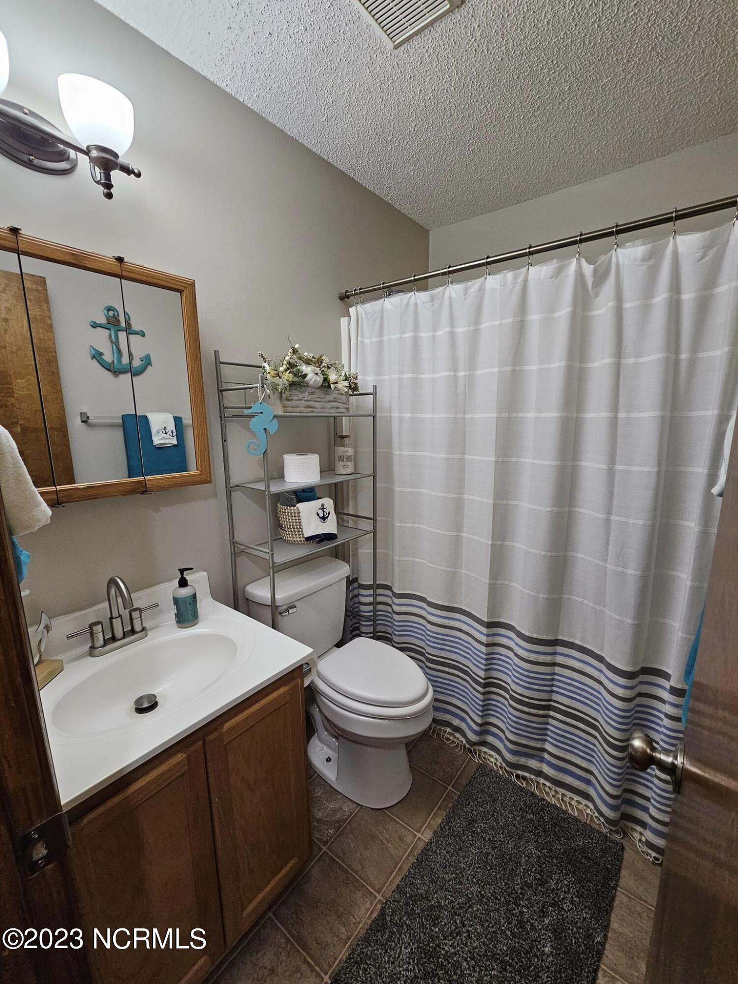 136 Fodder Drive Hubert, NC 28539 - Photo 11 of 28 Bathroom1