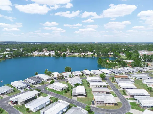 a view of a lake with couches