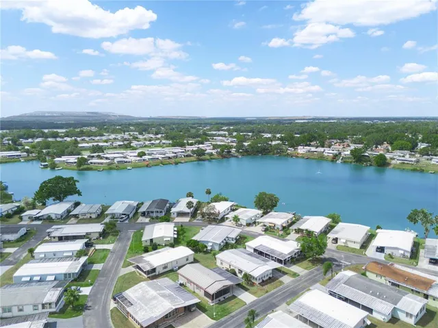 a view of a lake with a city