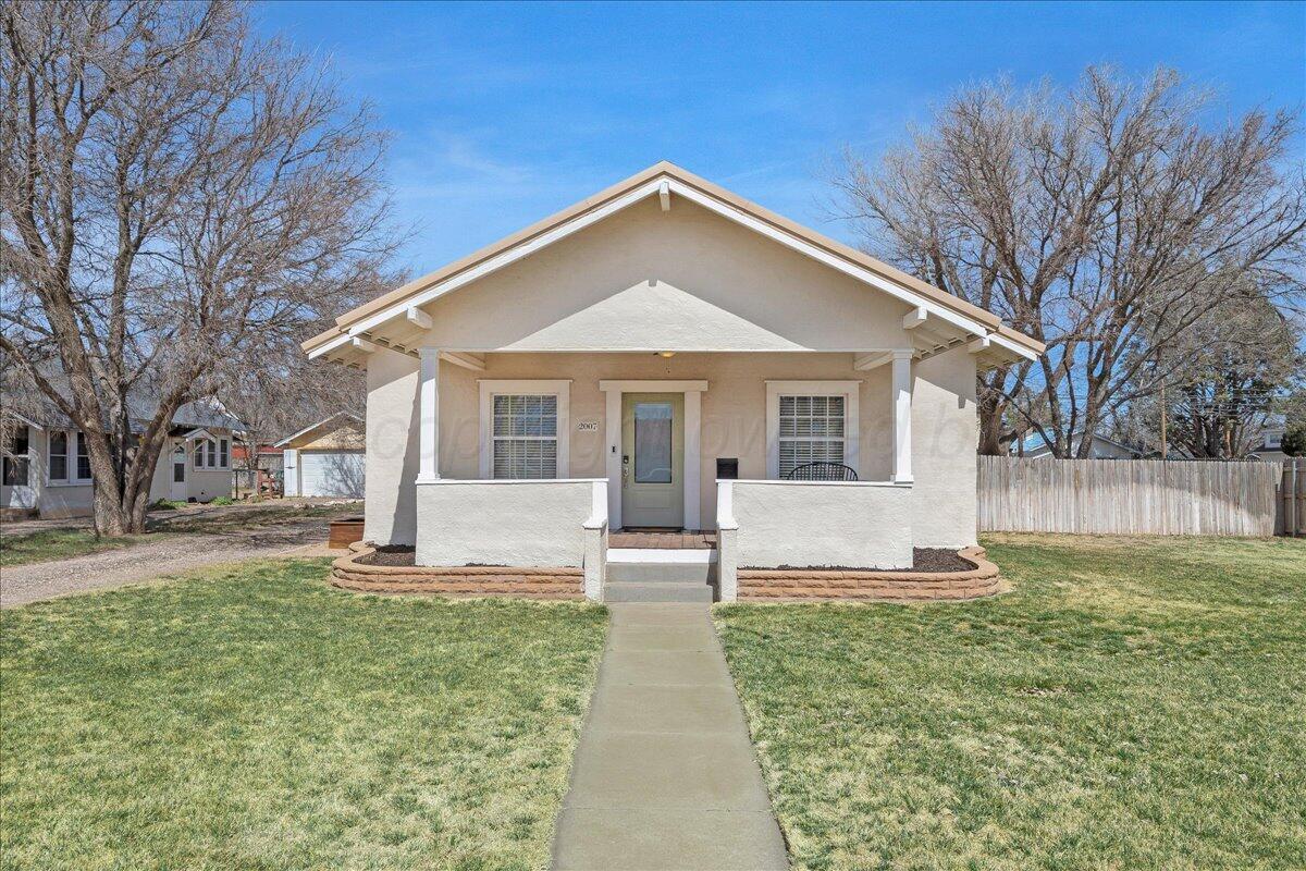 2007 6th Avenue Canyon, TX 79015 - Photo 1 of 33 a front view of a house with a yard and trees