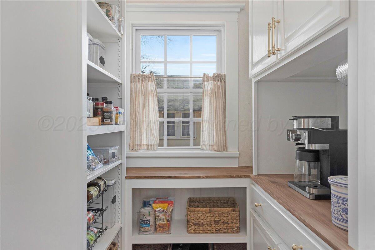 2007 6th Avenue Canyon, TX 79015 - Photo 11 of 33 a kitchen with a cabinets and a stove