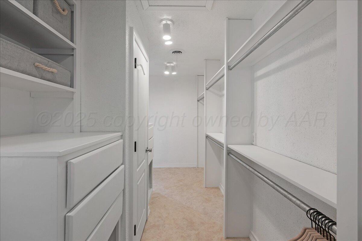 2007 6th Avenue Canyon, TX 79015 - Photo 15 of 33 a view of walk in closet
