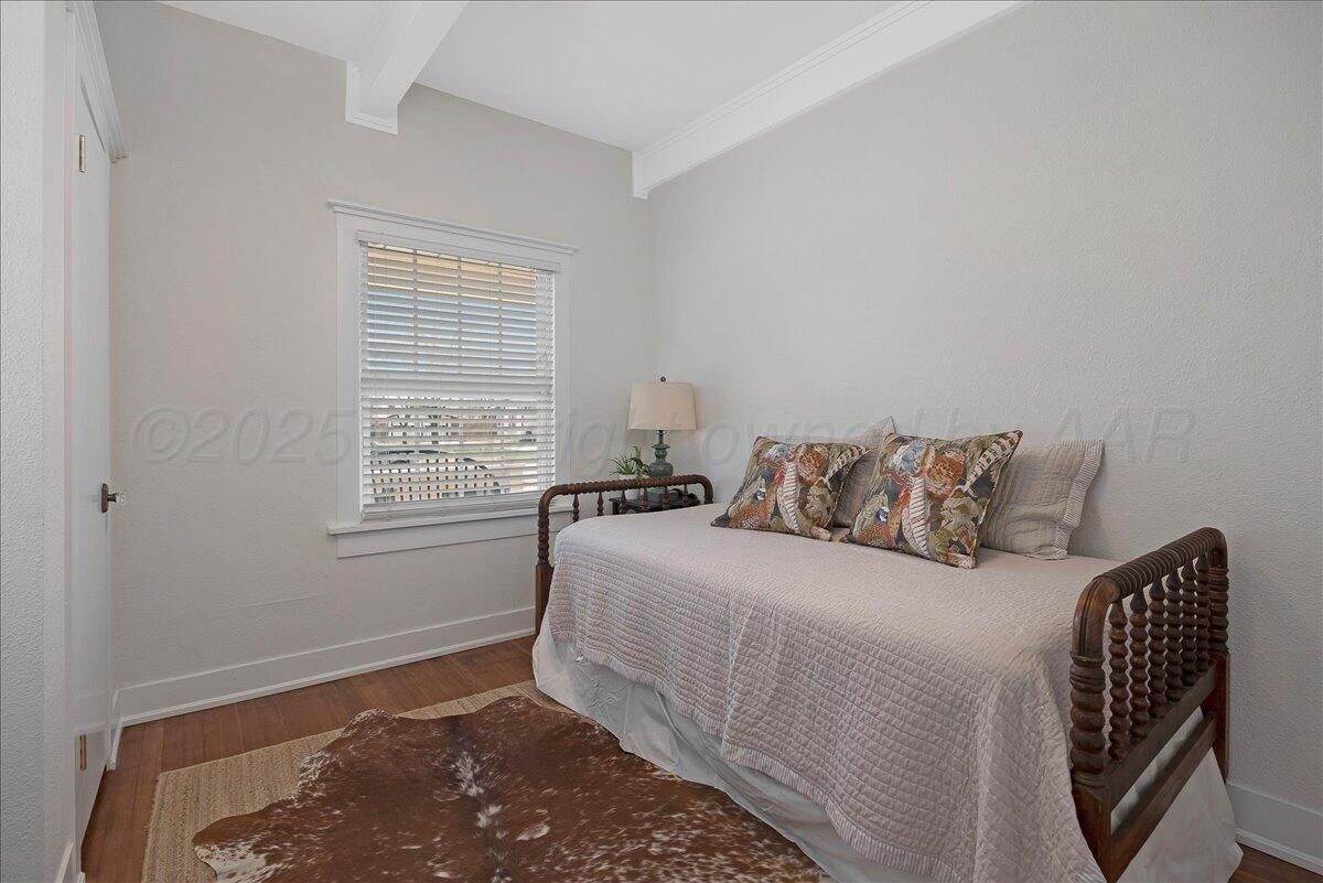 2007 6th Avenue Canyon, TX 79015 - Photo 17 of 33 a bedroom with a bed and a window