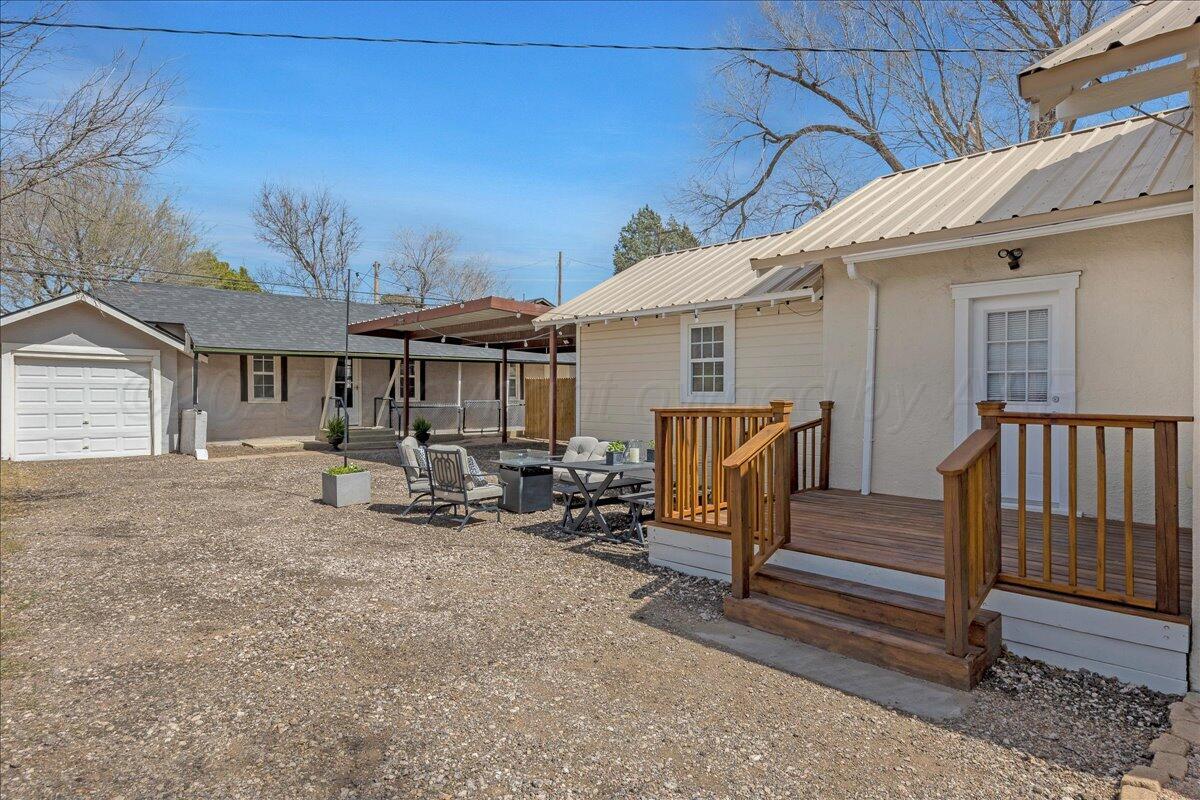 2007 6th Avenue Canyon, TX 79015 - Photo 22 of 33 a view of a house with wooden deck and furniture