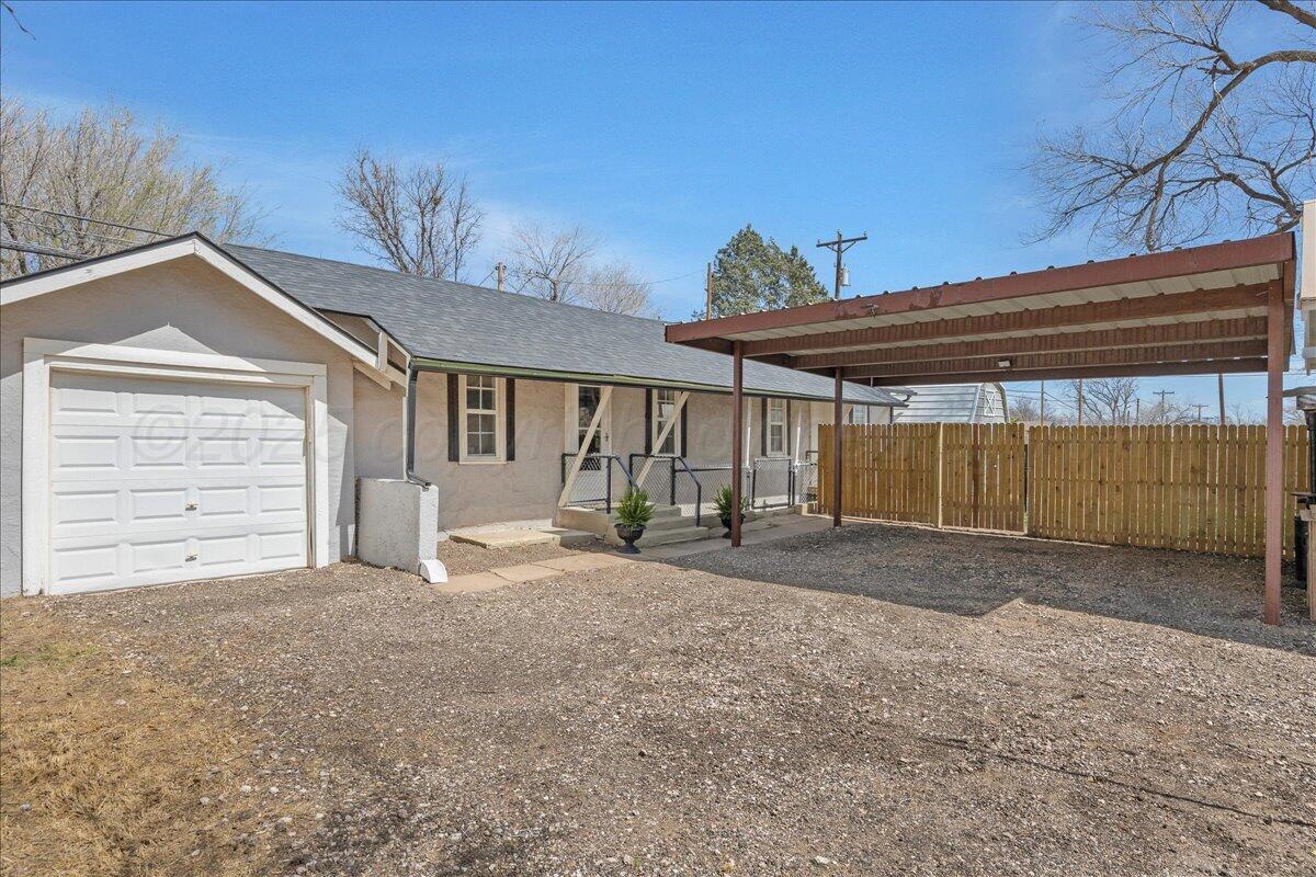 2007 6th Avenue Canyon, TX 79015 - Photo 24 of 33 a view of a house with a yard and garage