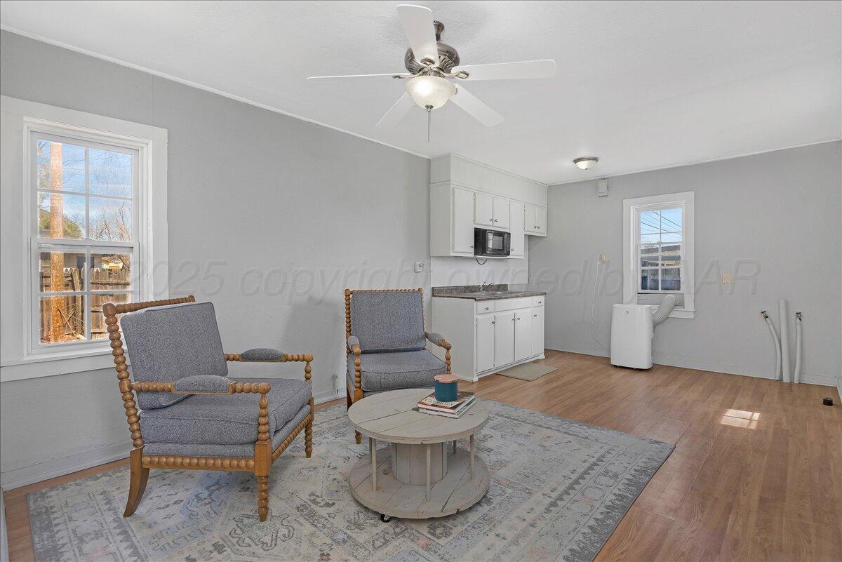 2007 6th Avenue Canyon, TX 79015 - Photo 25 of 33 a living room with furniture and a chair
