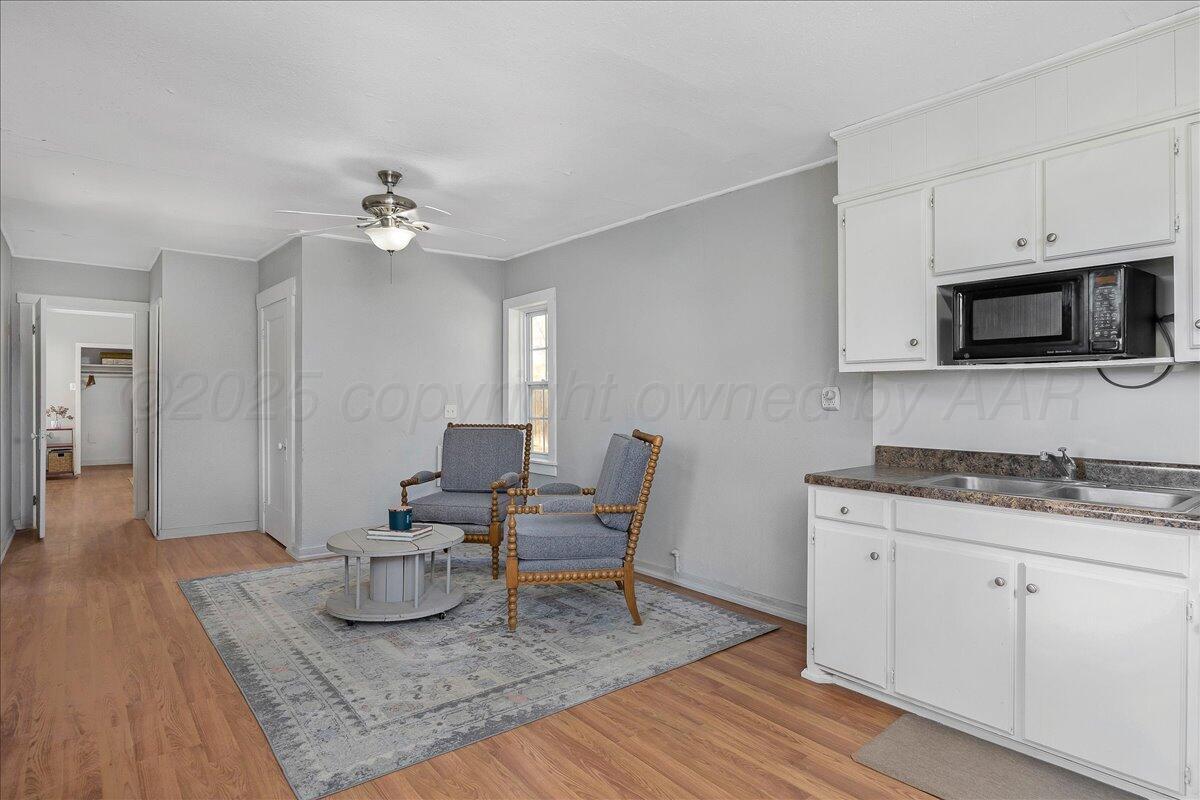 2007 6th Avenue Canyon, TX 79015 - Photo 28 of 33 a living room with furniture and wooden floor