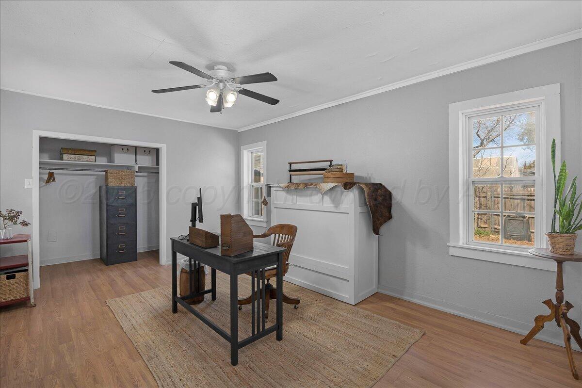 2007 6th Avenue Canyon, TX 79015 - Photo 29 of 33 a view of a workspace with furniture and a window