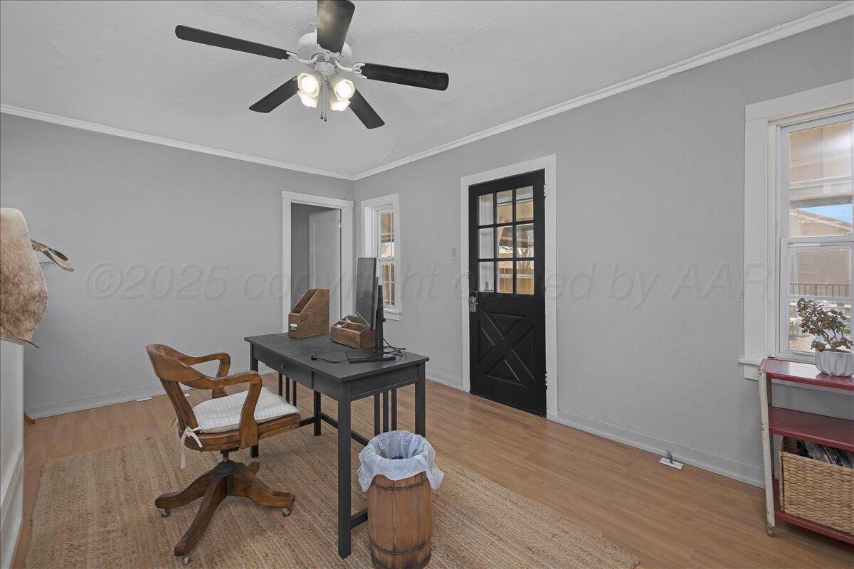 2007 6th Avenue Canyon, TX 79015 - Photo 30 of 33 a view of a workspace with furniture and a window