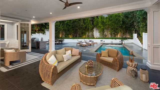 a bedroom with bed and a window