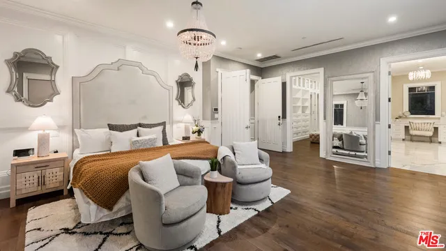 a bathroom with a sink toilet vanity and shower