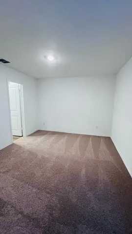 an empty room with a natural light