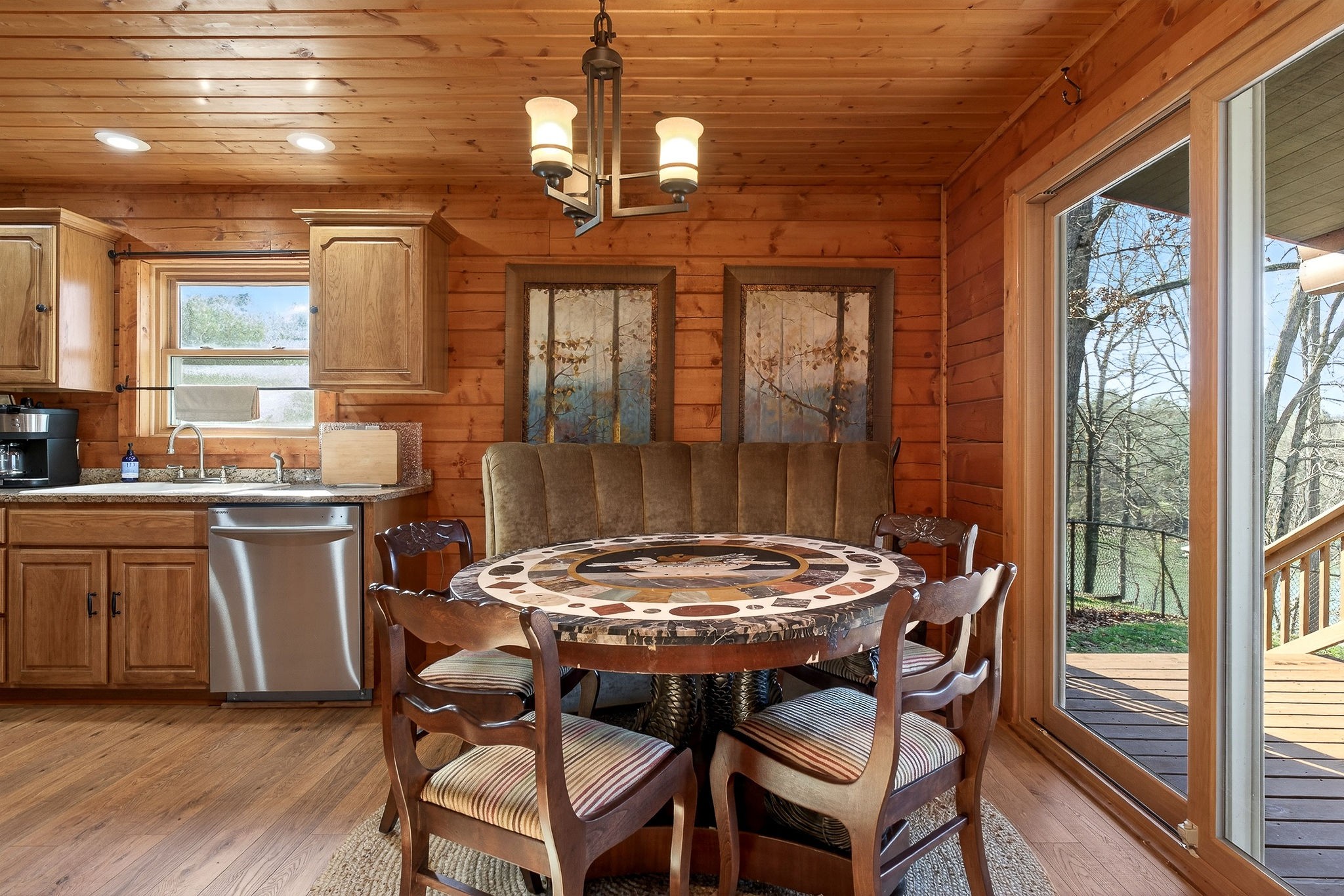 142 Rayahs Way Quebeck, TN 38579 - Photo 20 of 73 a dining room with furniture a chandelier and wooden floor
