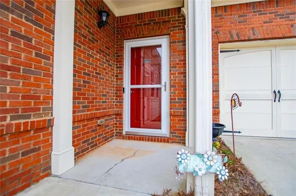 a kitchen with stainless steel appliances granite countertop a refrigerator a stove top oven a sink and dishwasher