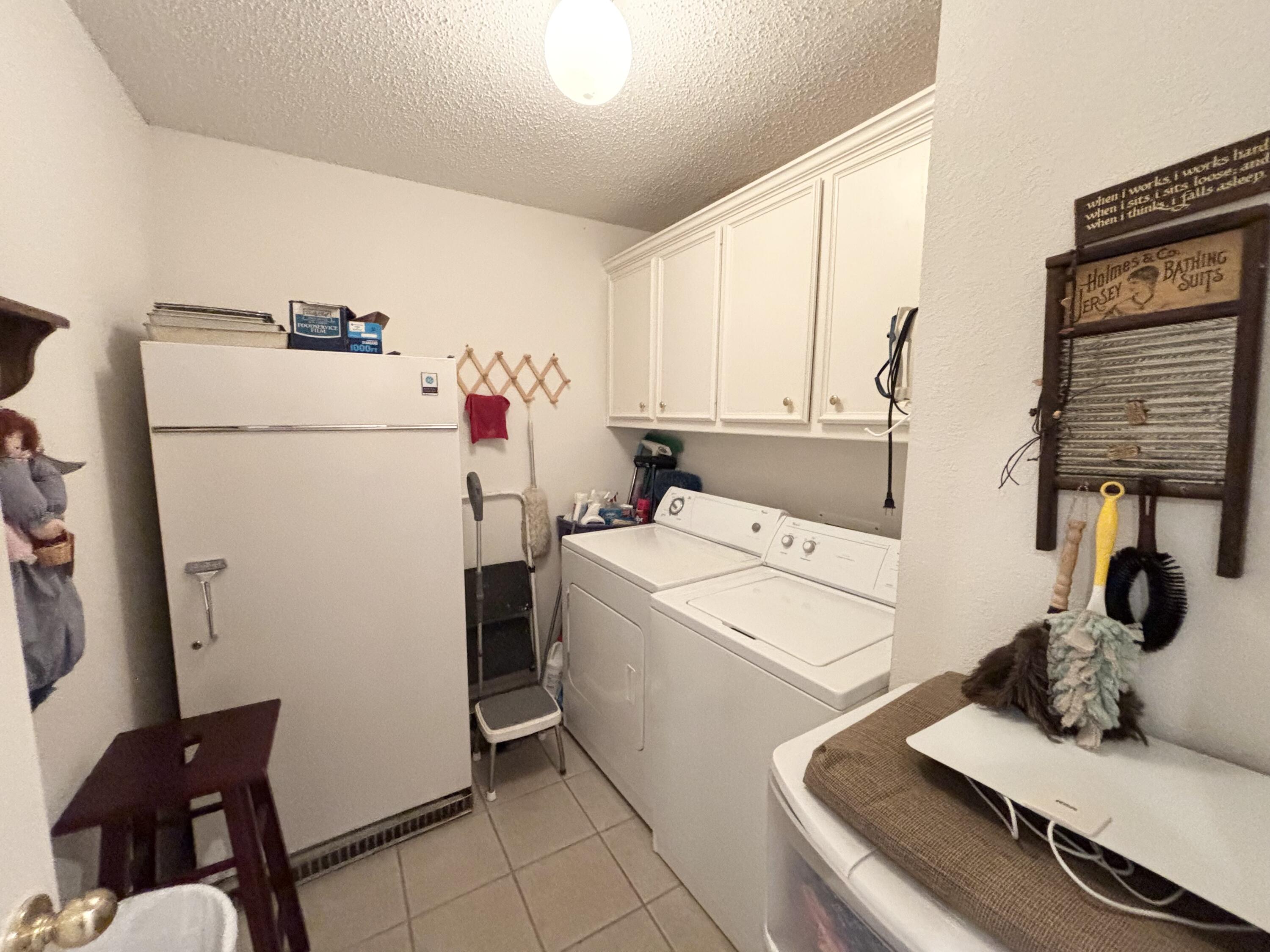 306 Ave M Abernathy, TX 79311 - Photo 17 of 22 a utility room with dryer and washer