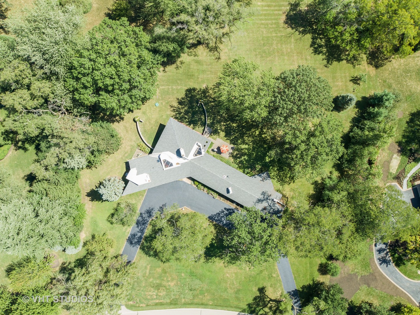 871 Braeburn Road Inverness, IL 60067 - Photo 15 of 47 an aerial view of a house with a yard and lake view