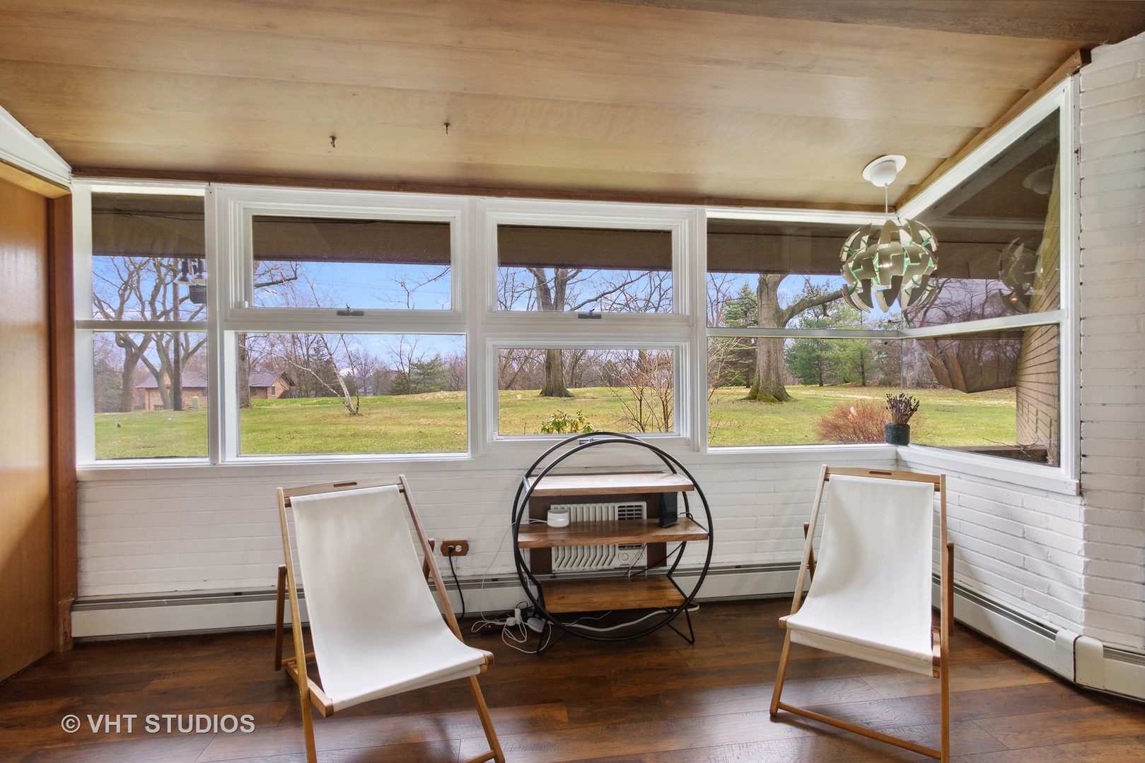871 Braeburn Road Inverness, IL 60067 - Photo 29 of 47 a view of a dining room with furniture a chandelier and wooden floor
