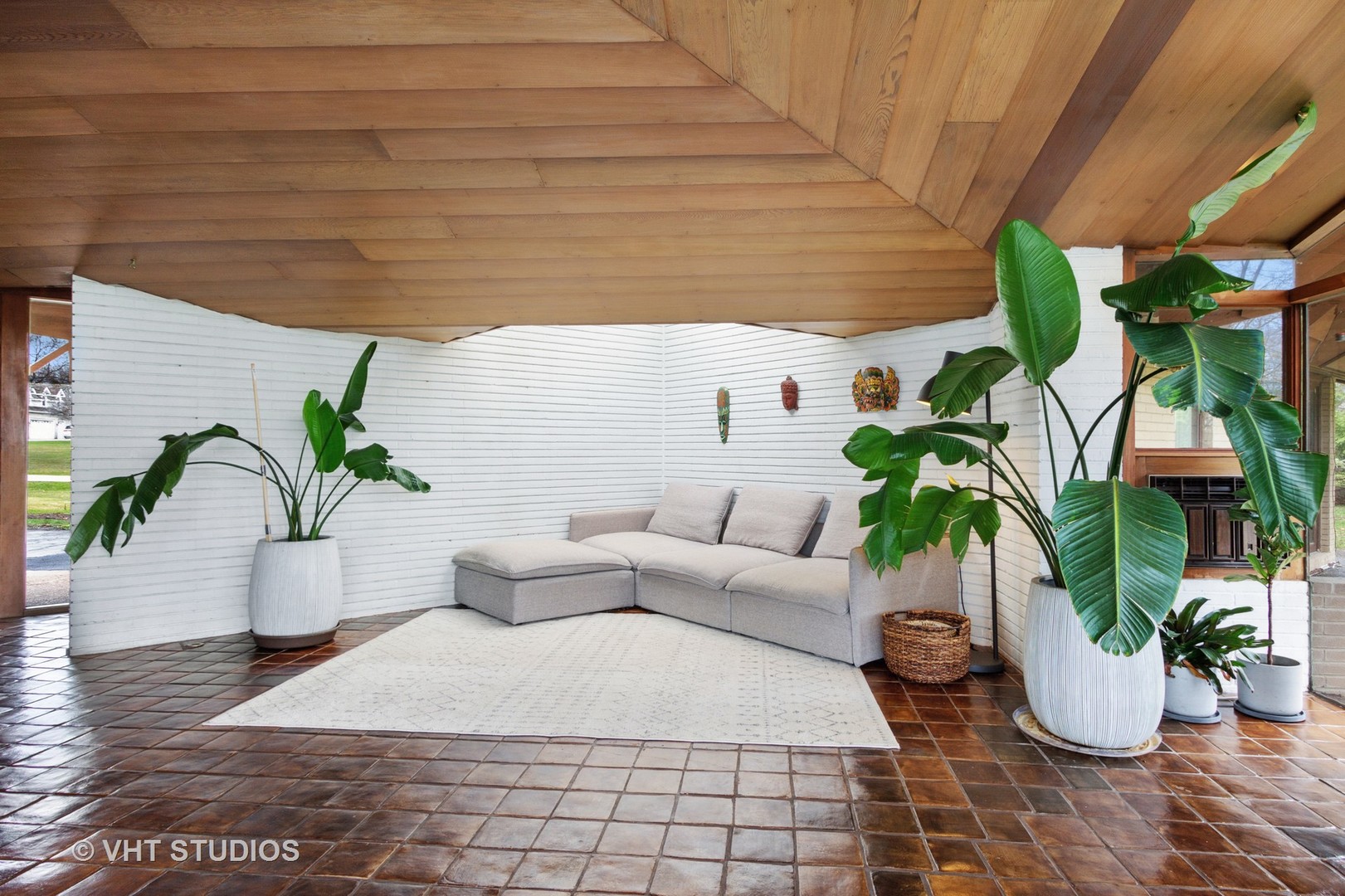 871 Braeburn Road Inverness, IL 60067 - Photo 6 of 47 a potted plant sitting on a wooden floor