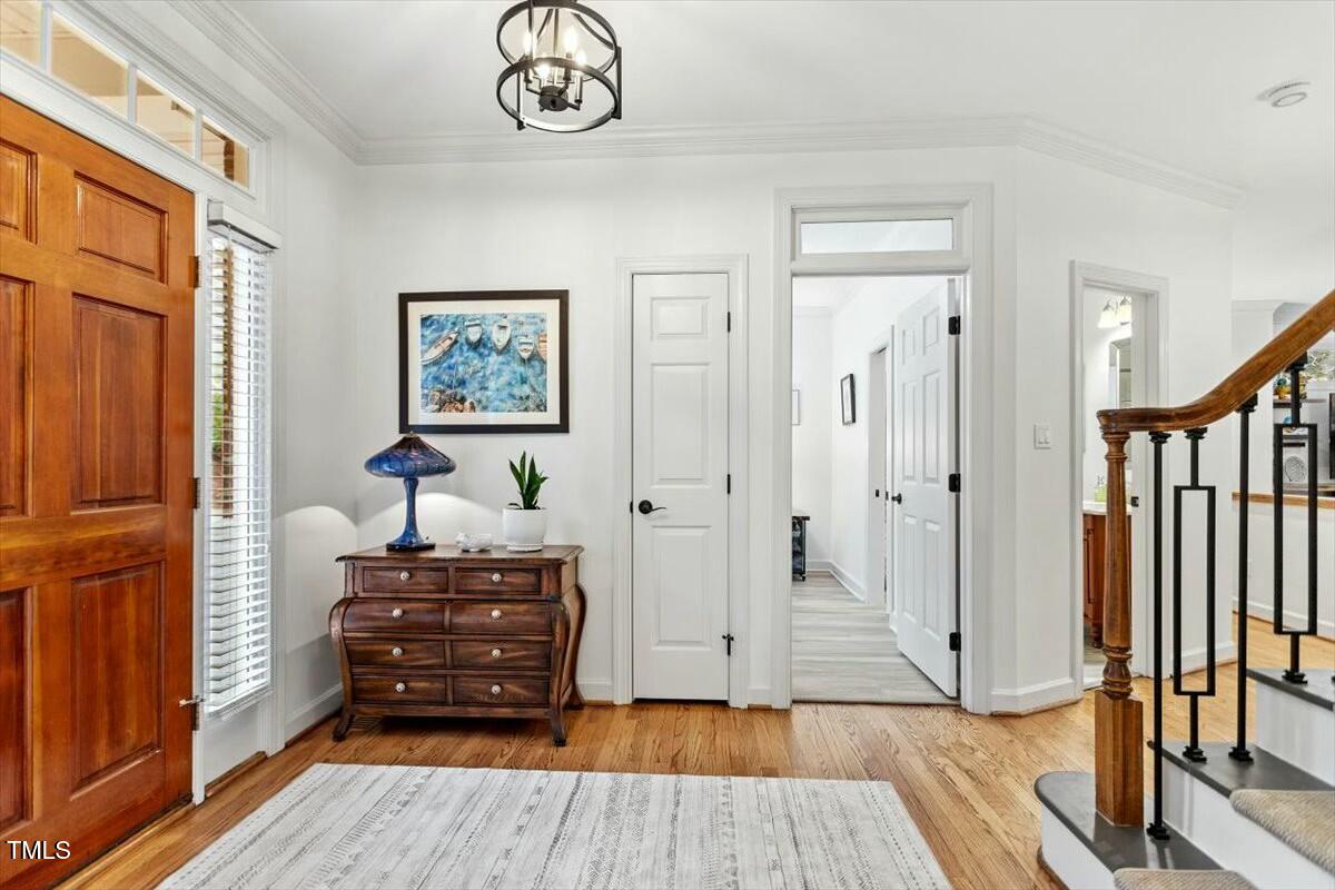 407 Crickentree Drive Cary, NC 27518 - Photo 7 of 78 a view of room with wooden floor
