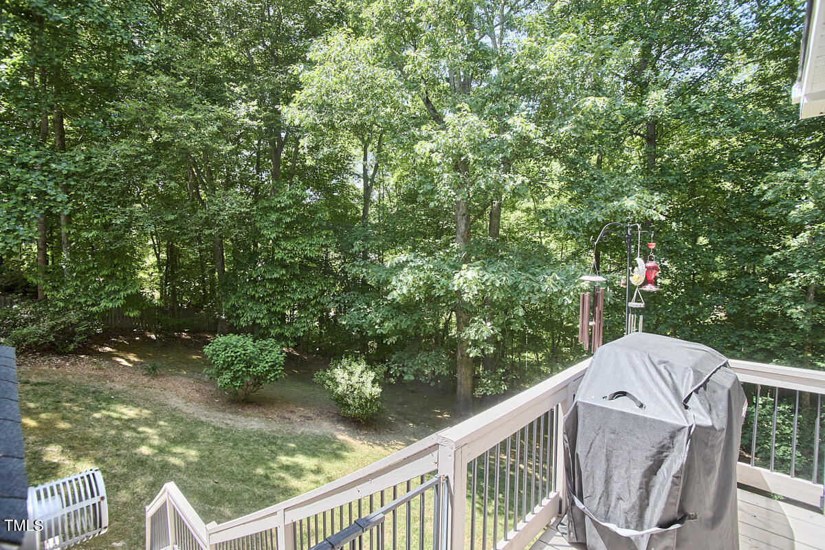407 Crickentree Drive Cary, NC 27518 - Photo 75 of 78 a view of a balcony with wooden fence