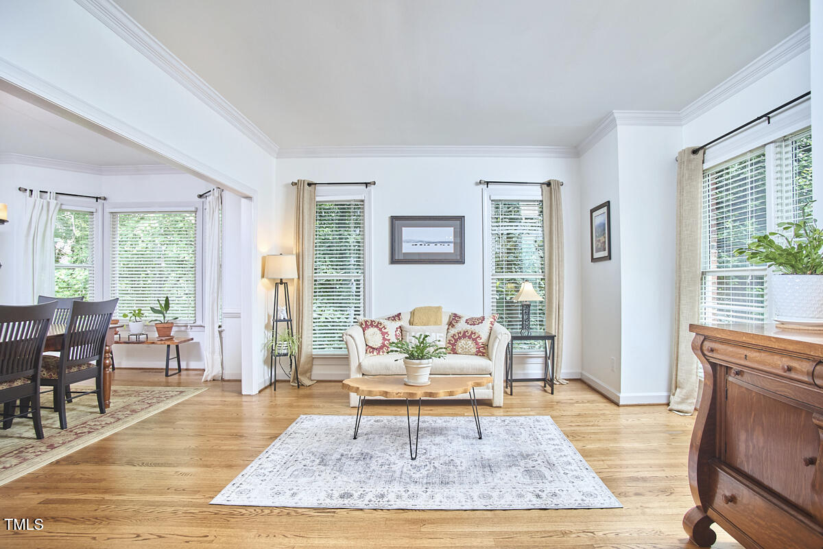 407 Crickentree Drive Cary, NC 27518 - Photo 8 of 78 a living room with furniture rug and window