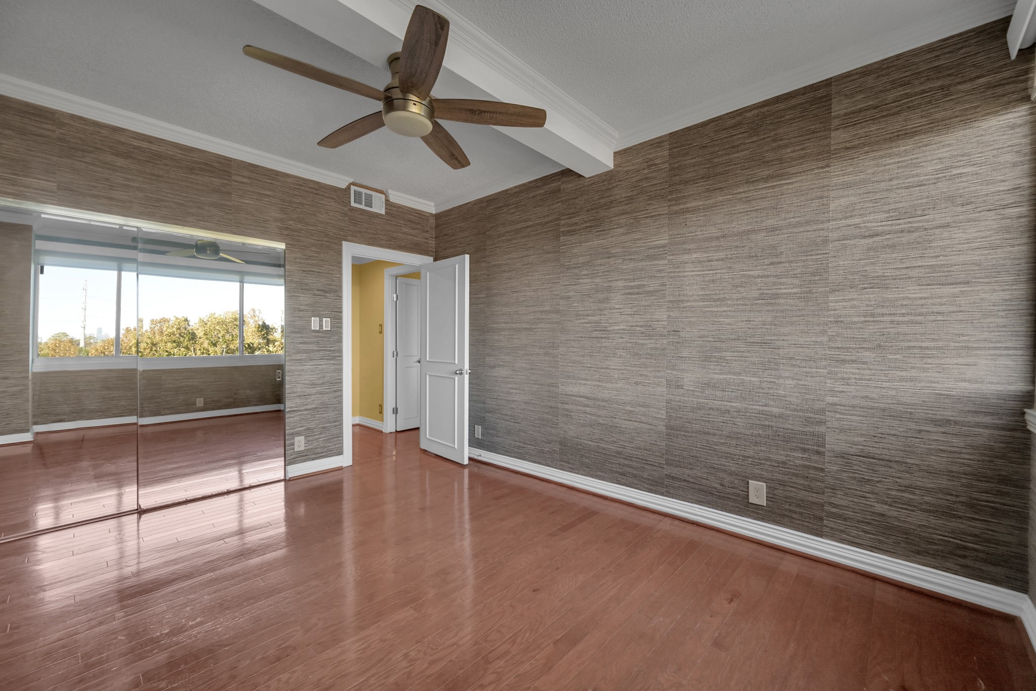 49 Briar Hollow Lane, Unit 504 Houston, TX 77027 - Photo 21 of 25 a view of an empty room with a window