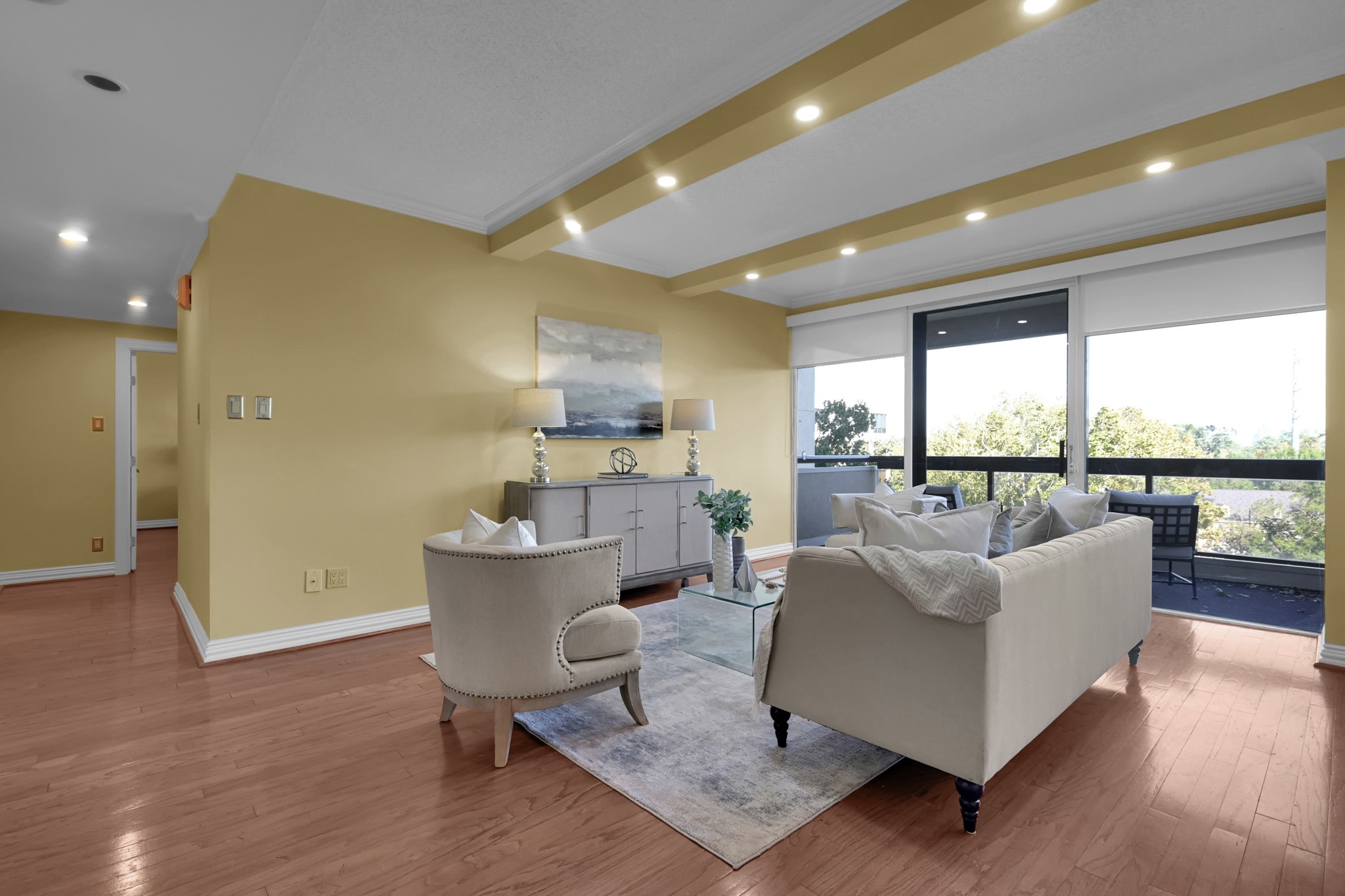 49 Briar Hollow Lane, Unit 504 Houston, TX 77027 - Photo 4 of 25 a living room with furniture and a large window