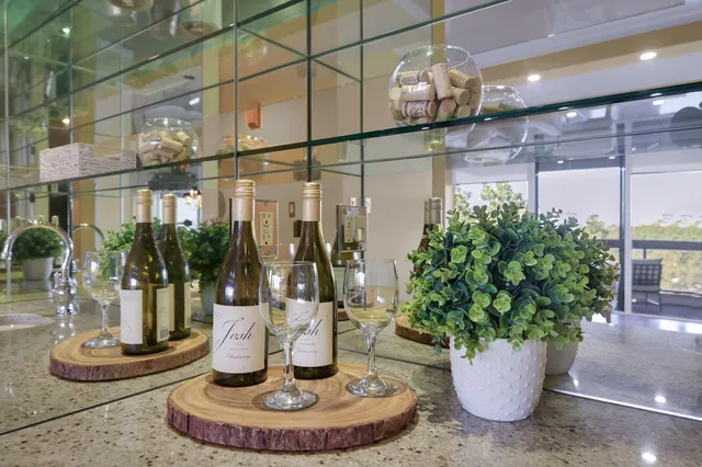 a vase of flowers sitting on a table