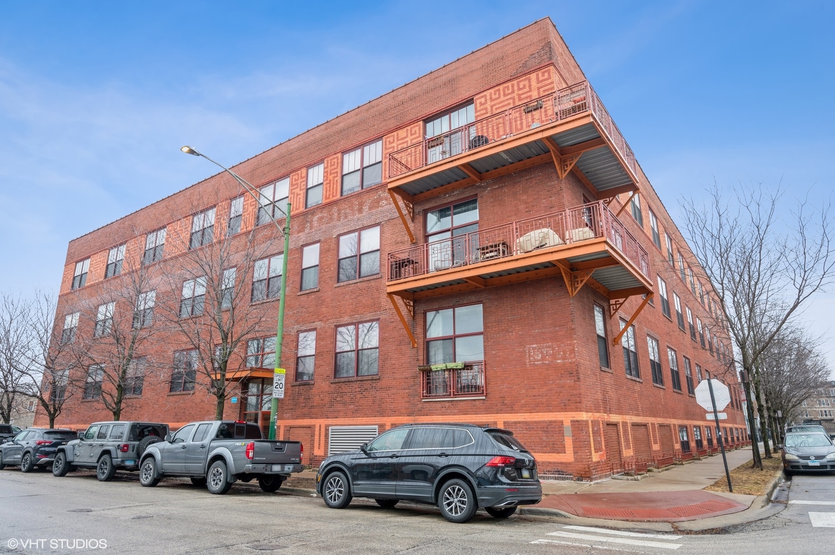 1061 West 16th Street, Unit 201 Chicago, IL 60608 - Photo 1 of 14 a car parked in front of a building