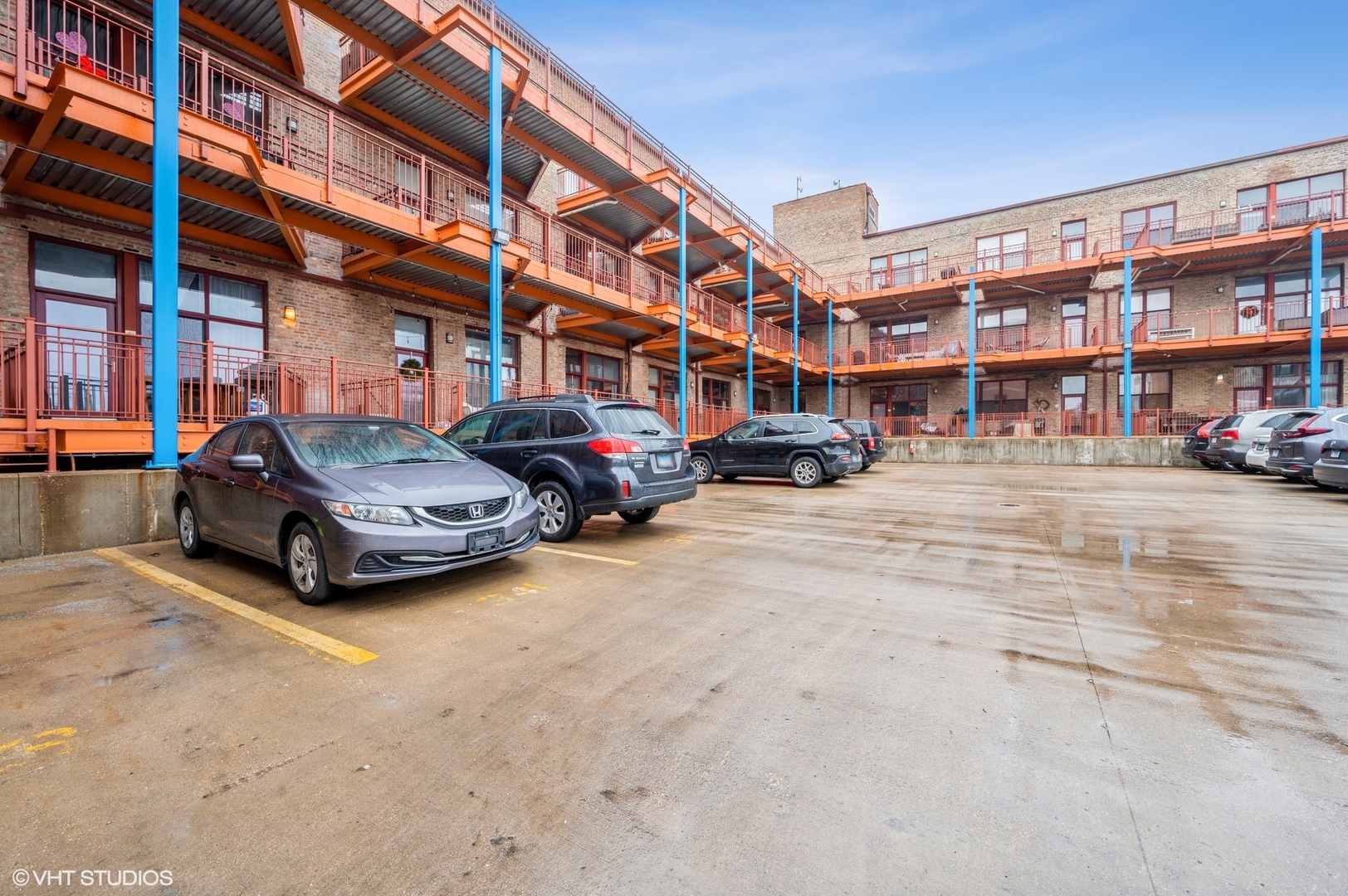 1061 West 16th Street, Unit 201 Chicago, IL 60608 - Photo 10 of 14 a car parked in front of a building