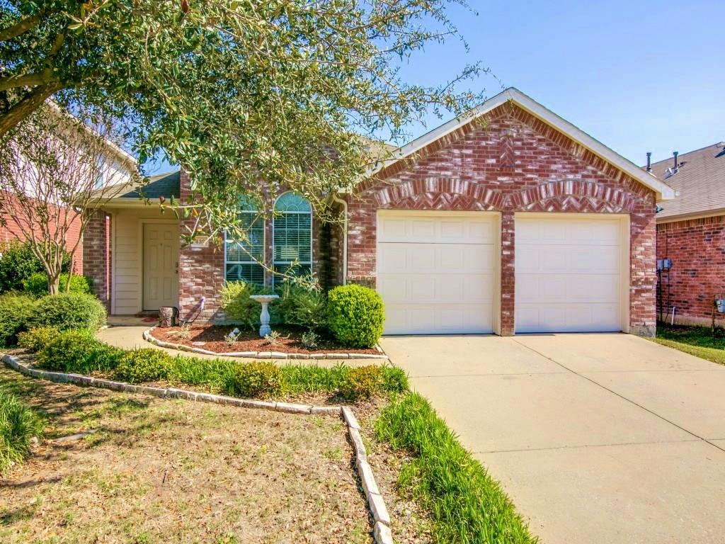 439 Butternut Drive Fate, TX 75087 - Photo 1 of 1 a front view of a house with a yard and garage