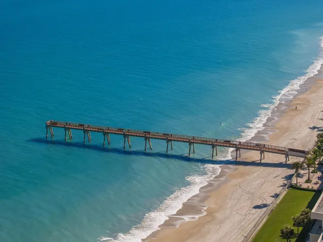 a view of a patio with a yard