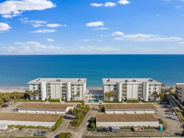 a front view of a building with street view