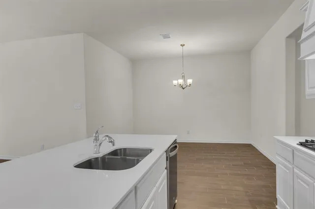 a view of kitchen and sink