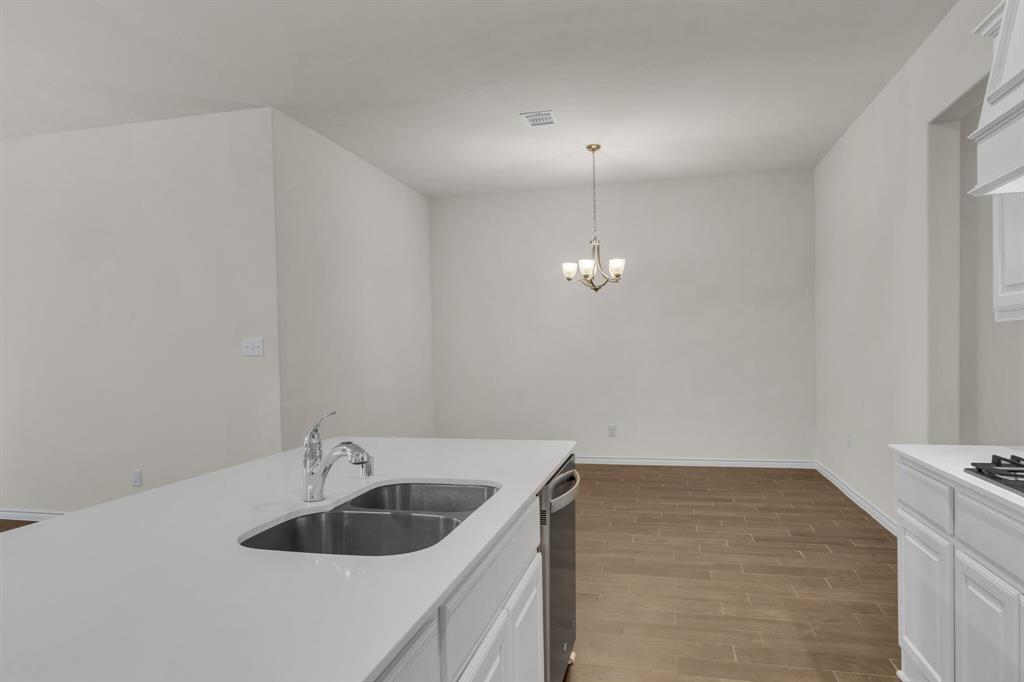 3106 Maverick Drive Forney, TX 75126 - Photo 12 of 29 a view of kitchen and sink