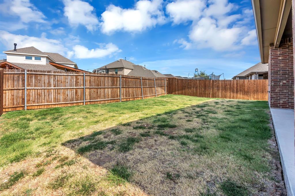 3106 Maverick Drive Forney, TX 75126 - Photo 25 of 29 a view of a backyard