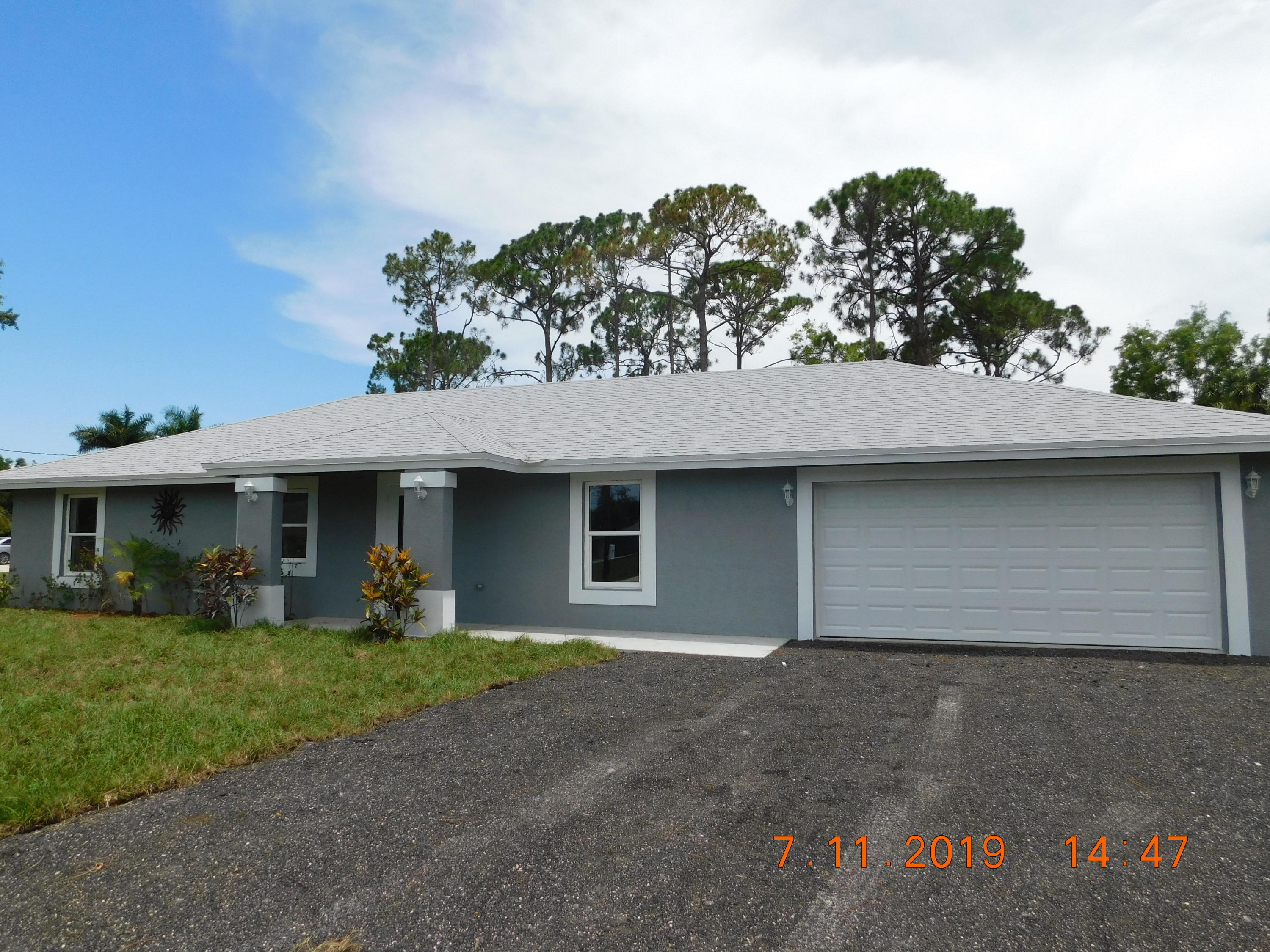 13836 55th Road North West Palm Beach, FL 33411 - Photo 1 of 13 Front Right