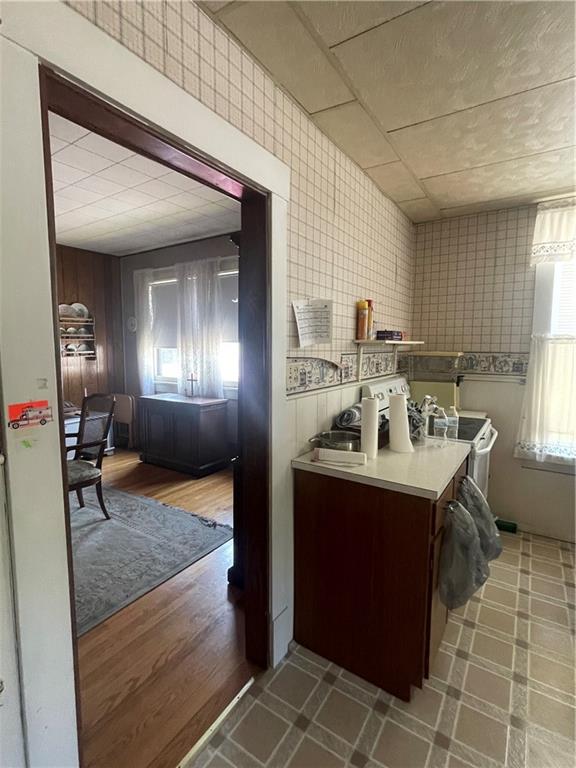 233 East Pine Street Grove City, PA 16127 - Photo 14 of 26 a view of a kitchen with a sink and cabinets