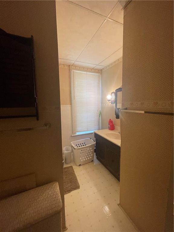 233 East Pine Street Grove City, PA 16127 - Photo 17 of 26 a bathroom with a tub sink and mirror